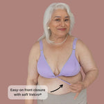 Mature model showing off the Springrose easy on bra's velcro front closure